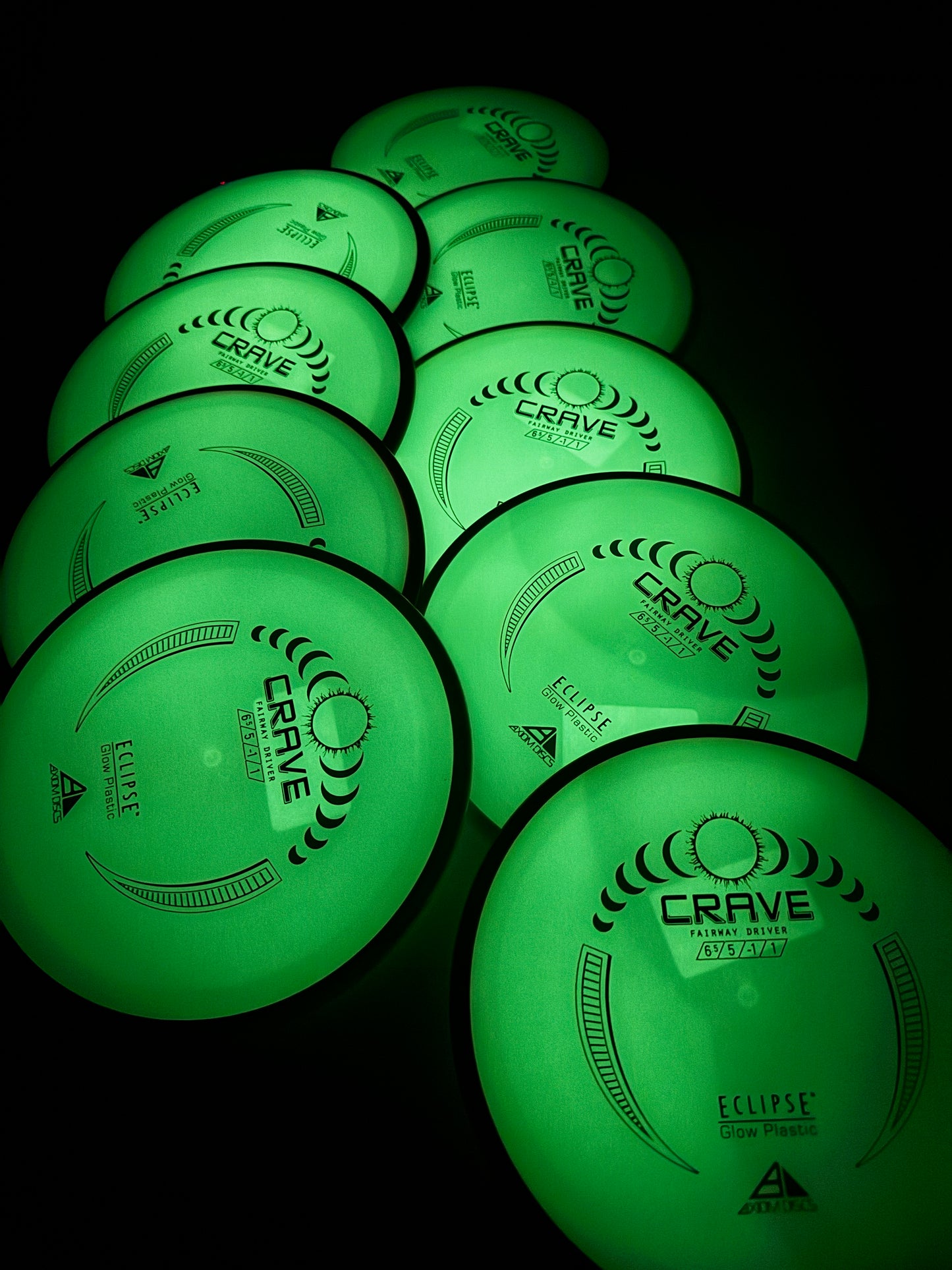 Green discs with 'Crave' branding on a black background